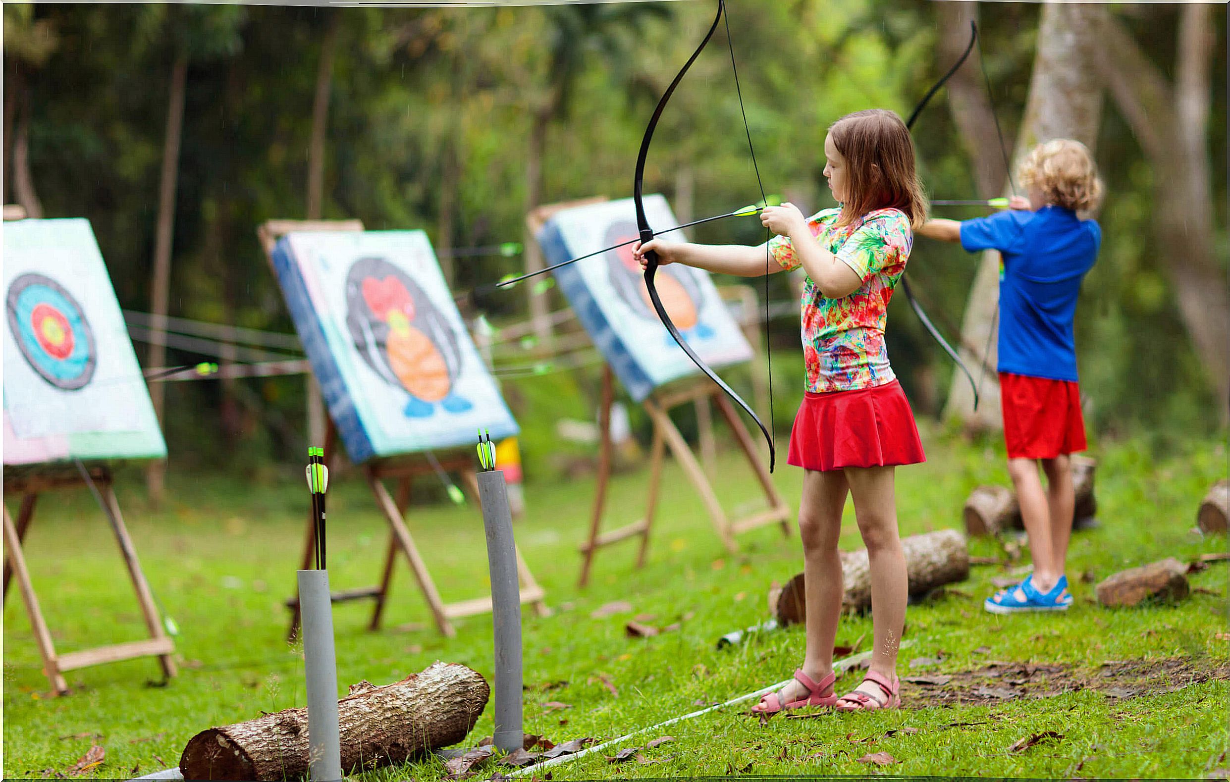 Children practicing archery.