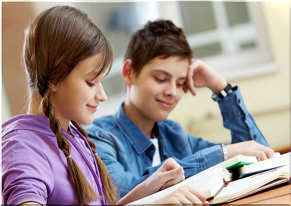 Kids reading some of the book recommendations for children ages 8-10.