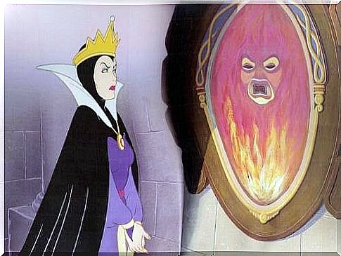 Snow White's stepmother talking to the magic mirror.