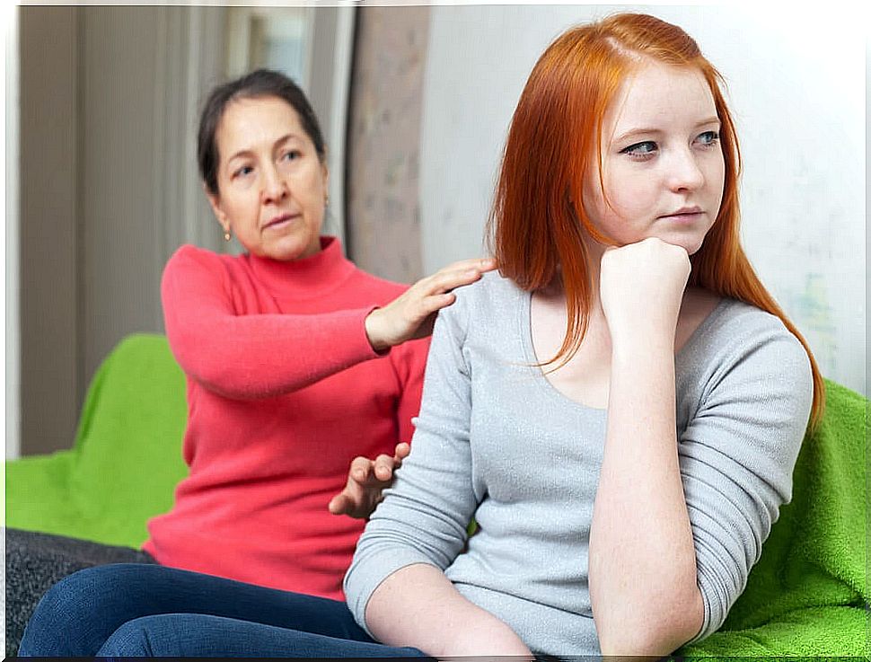 Mother trying to communicate with her teenage daughter.