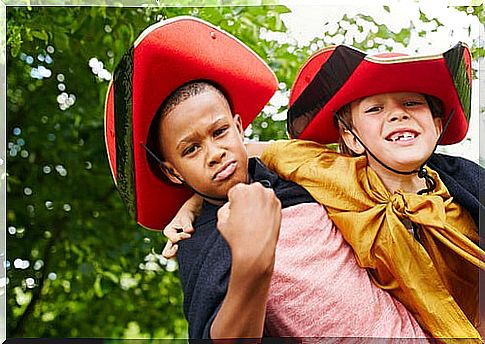 Children in costume playing