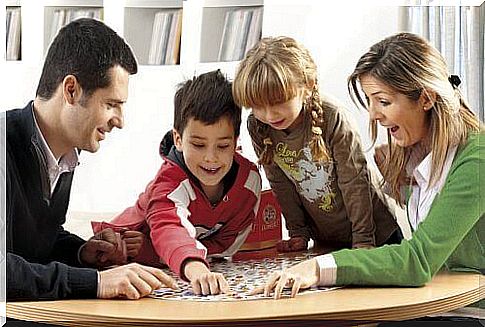 Reconstituted family playing board games.