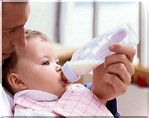 dad giving bottle