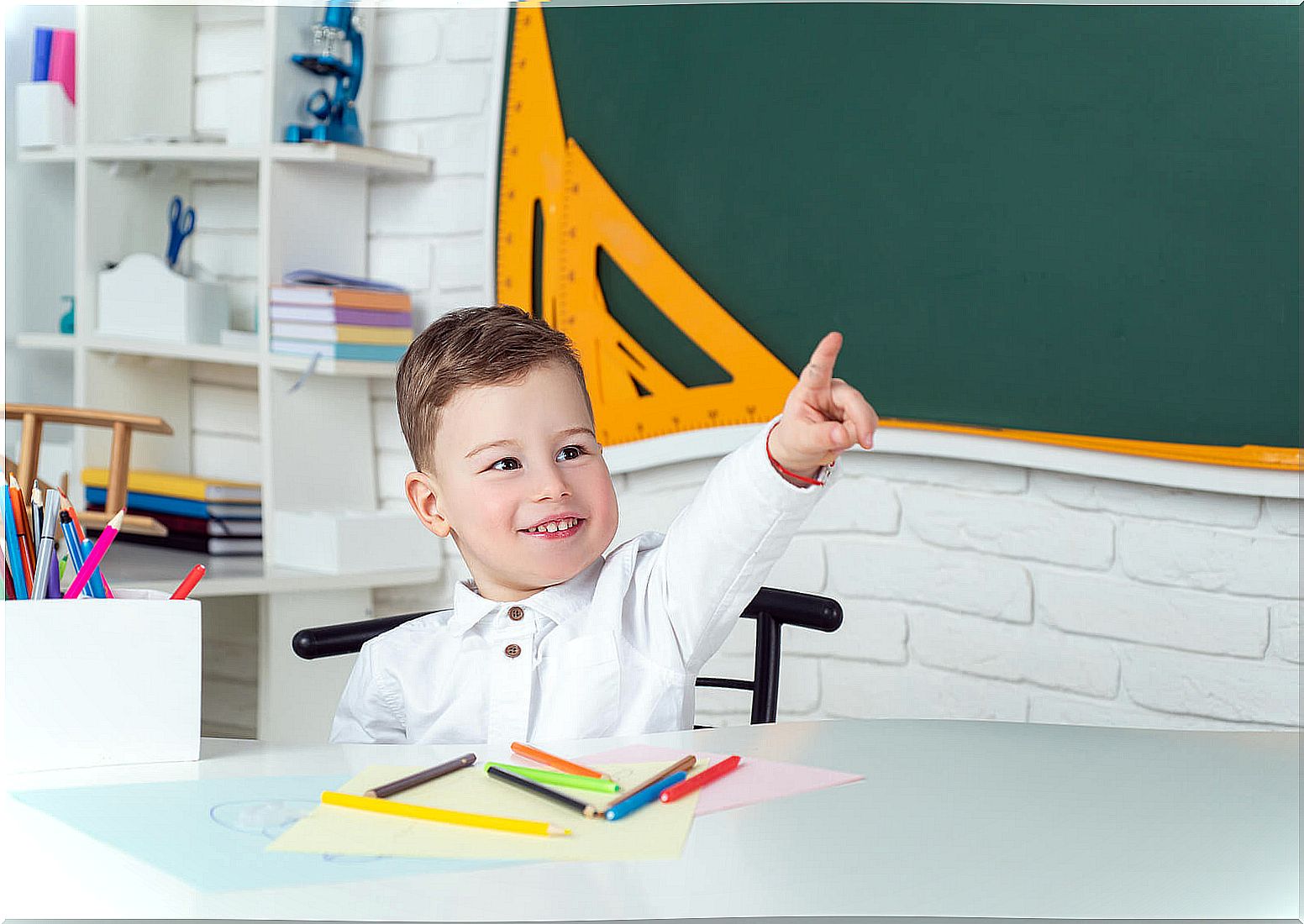 Child in class learning.