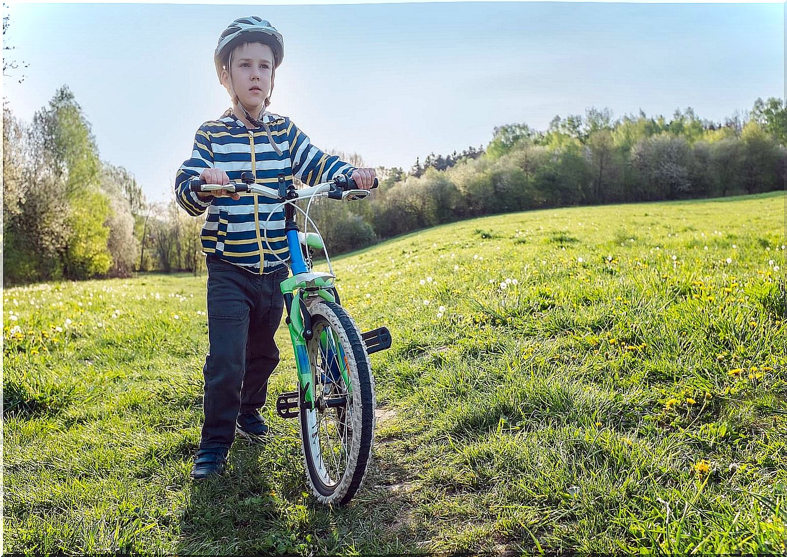 Child with asthma riding a bicycle.