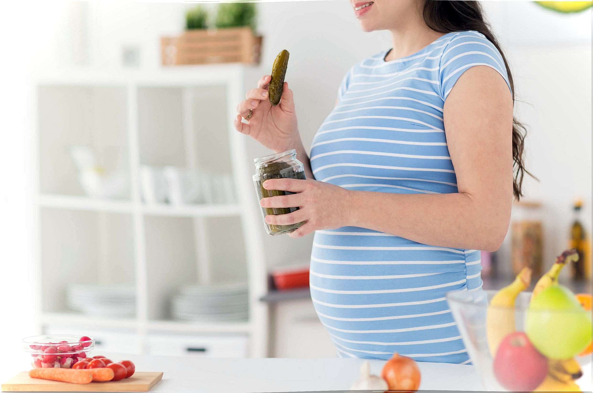 Pregnant woman craving pickles.